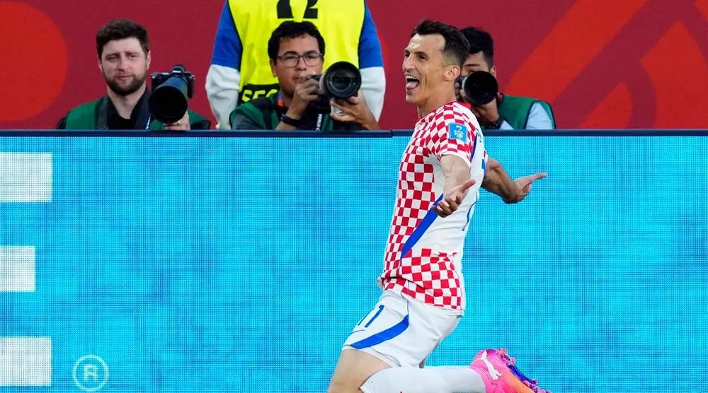  Croatia's Ante Budimir (11) celebrates a goal against Panama during the second half of a World Cup Group L soccer match, in Toronto, on Tuesday, June 23, 2026. (Frank Gunn/The Canadian Press via AP) 