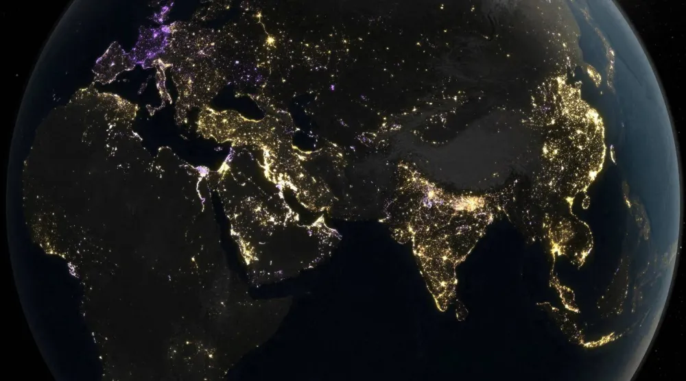 FILE PHOTO: A nighttime view of Earth, derived from satellite images taken daily over the past decade, capturing human activity on the planet through the emissions of artificial light, is seen in this image released on April 8, 2026. Michala Garrison/NASA Earth Observatory/Handout via REUTERS 