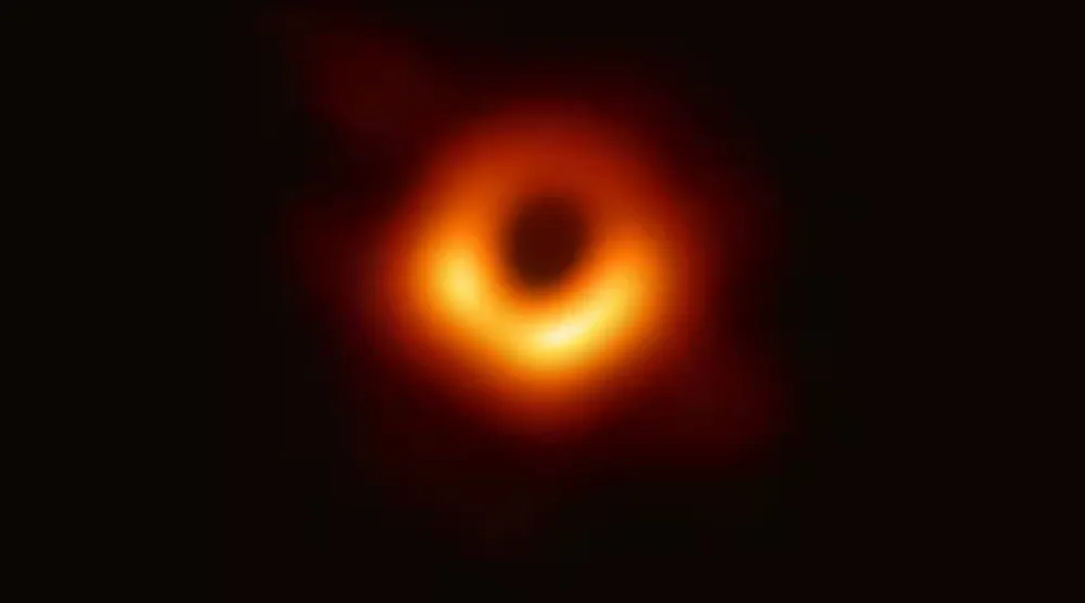 An actual image of the black hole where scientists looked for a ring of light, which is matter and radiation circling at extreme speeds around a region of darkness representing the black hole. (Event Horizon Telescope collaboration)
