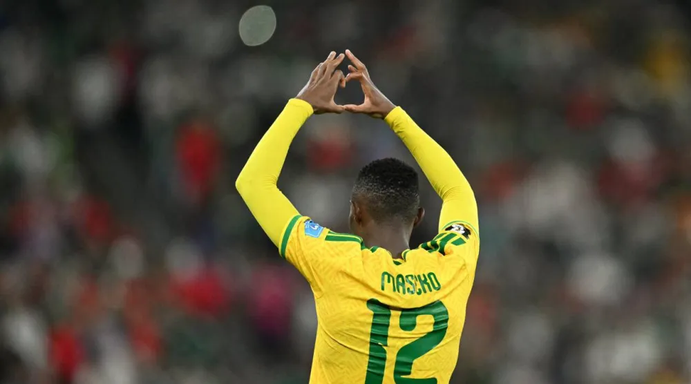 South Africa forward Thapelo Maseko celebrates scoring against South Korea in their World Cup Group A match. Yuri CORTEZ / AFP
