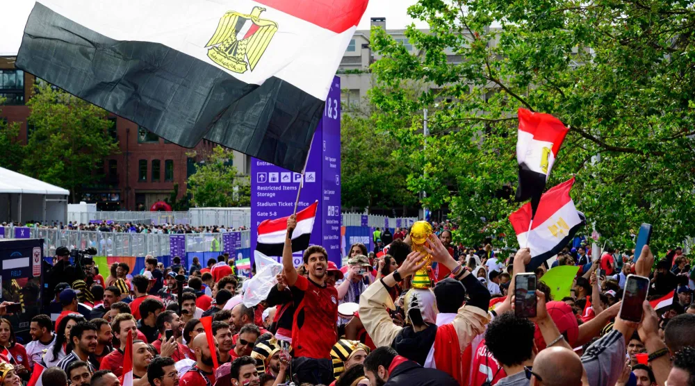 الجماهير المصرية احتفلت في سياتل بتأهل الفراعنة لدور الـ32 (أ.ف.ب)