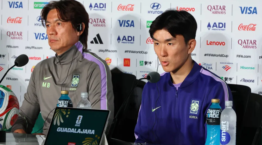 South Korean men's national football team head coach Hong Myung-bo (L) and midfielder Hwang In-beom attend a press conference at Estadio Guadalajara in Zapopan, Mexico, 17 June 2026, a day ahead of their second Group A match. EPA/YONHAP