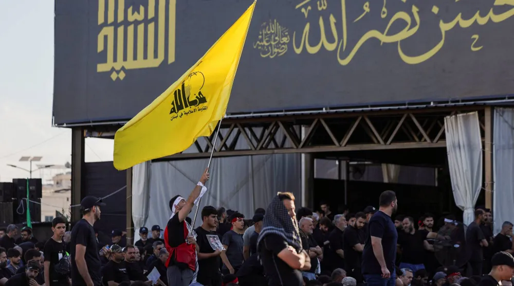 مناصرون لـ«حزب الله» يشاركون في إحياء ذكرى عاشوراء بالضاحية الجنوبية لبيروت يوم الجمعة الماضي (رويترز)