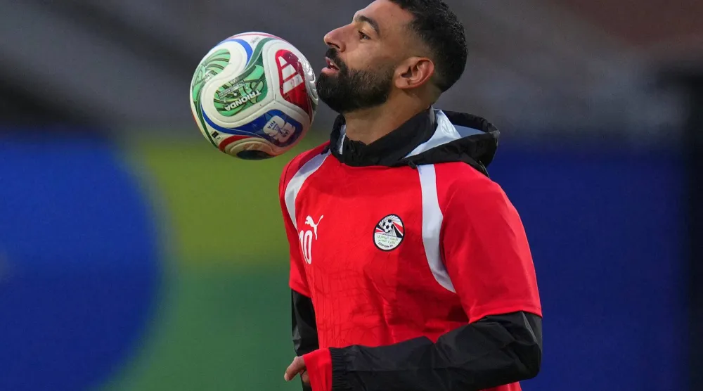 صلاح يعتبر أحد أبرز عناصر منتخب مصر الطامح لبلوغ دور الـ16 (أ.ب) 