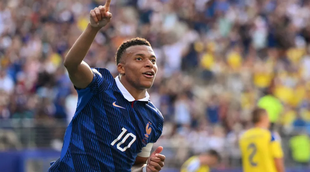 France's forward #10 Kylian Mbappe celebrates scoring his team's third goal during the 2026 World Cup round of 32 football match between France and Sweden at the New York/New Jersey Stadium in East Rutherford on June 30, 2026. (AFP) 