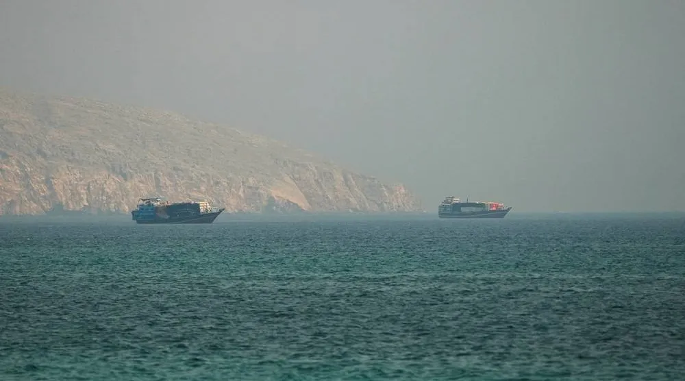 Vessels at the Strait of Hormuz, as seen from Musandam, Oman, July 9, 2026. (Reuters)