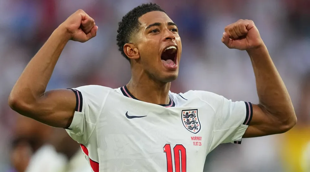 Jude Bellingham celebrates England's victory over Norway in a World Cup quarterfinal soccer match in Miami Gardens, Fla., Saturday, July 11, 2026. (AP Photo/Julio Cortez)