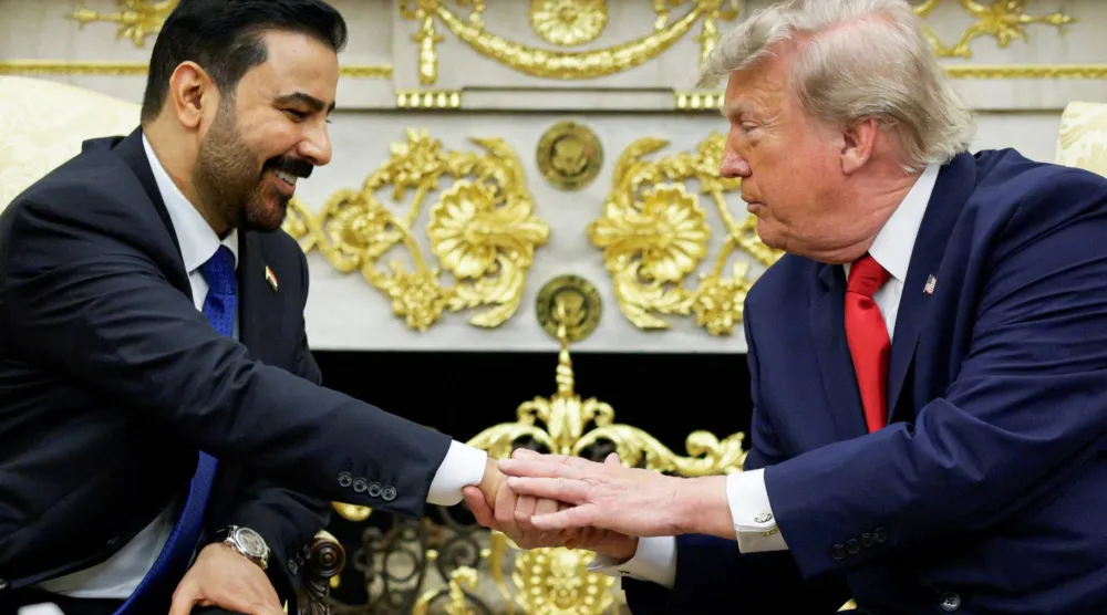 US President Donald Trump shakes hands with Iraqi Prime Minister Ali al-Zaidi as they participate in a bilateral meeting in the Oval Office at the White House in Washington, DC, US, July 14, 2026. (Reuters)