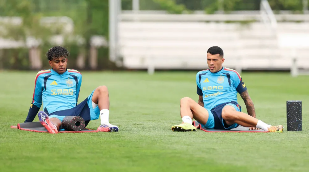 EAST HANOVER, NEW JERSEY - JULY 16: Lamine Yamal and Pedro Porro #12 of Spain train separately from the team during the training session at Melanie Lane Training Grounds on July 16, 2026 in East Hanover, New Jersey. Florencia Tan Jun/Getty Images/AFP