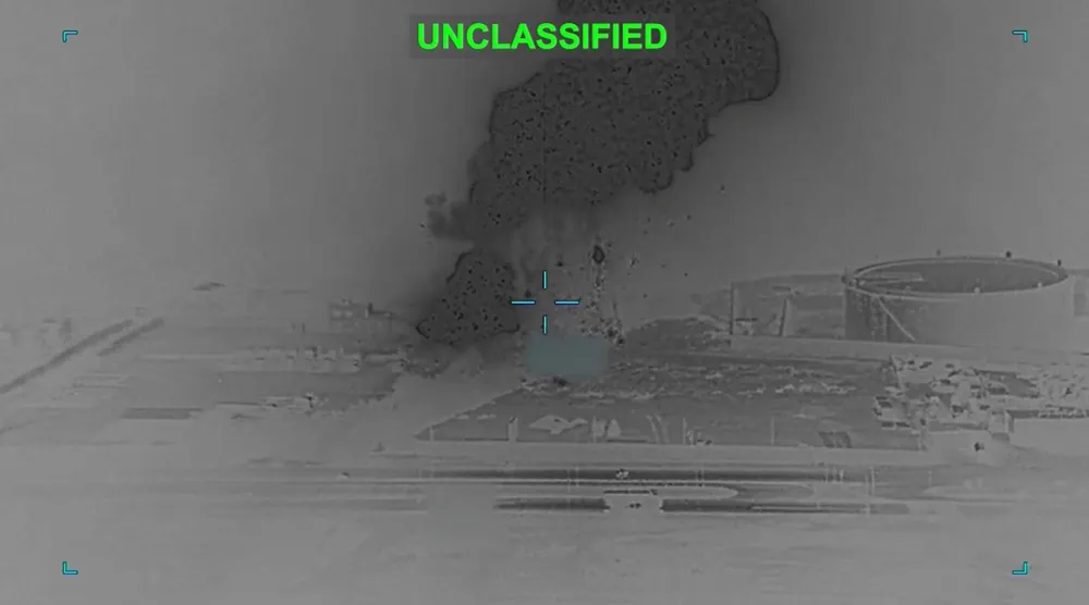 Smoke rises following a strike at an unknown location during what the US military says is its latest wave of strikes on Iran. US Central Command/Handout via REUTERS