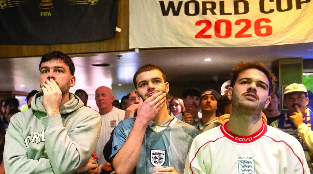 English football supporters react after Argentina defeated England in the FIFA World Cup 2026 semi-finals match, in Sydney, Australia, July 16, 2026. REUTERS/Jeremy Piper