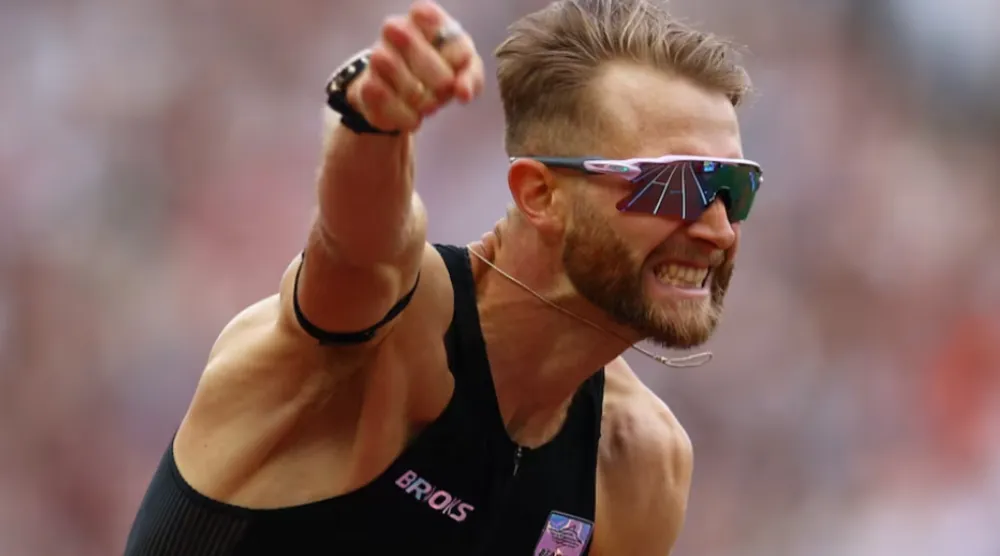 London, Britain - July 18, 2026 Britain's Josh Kerr celebrates after winning the men's 1 mile final and setting a new Meet Record, World Record, and Diamond League Record REUTERS/Matthew Childs 