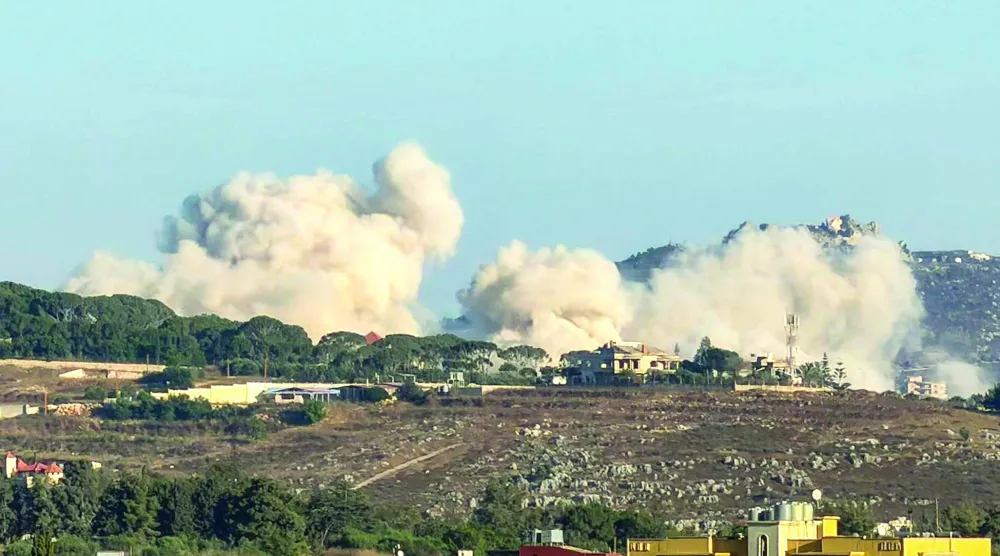Smoke rises following Israeli controlled-explosions in the village of Kfar Tibnit as seen from Nabatieh in southern Lebanon on July 18, 2026 (Photo by Abbas Fakih / AFP) / 