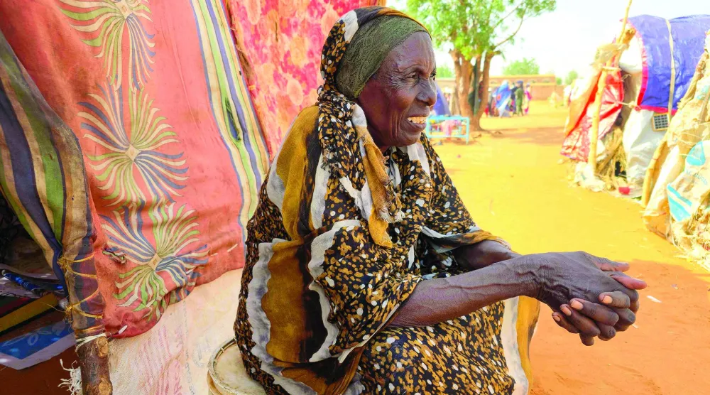 معاناة وجوع يرتسمان في محيا سودانية بمخيم الحمانية للنازحين جنوب كردفان 7 يوليو 2026 (أ.ف.ب)