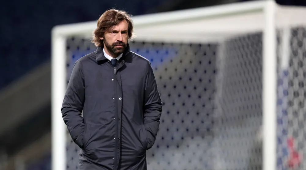 FILE - Juventus' head coach Andrea Pirlo stands on the pitch during warmup before the Champions League round of 16, first leg, soccer match between FC Porto and Juventus in Porto, Portugal, on Feb. 17, 2021. (AP Photo/Luis Vieira, File)