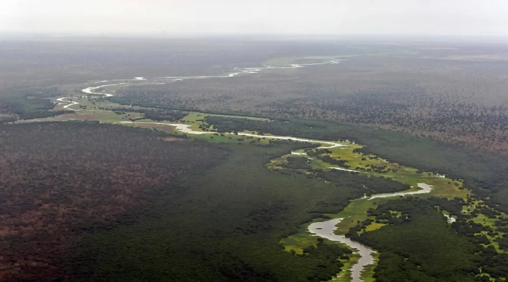 An aerial view of the Pibor river flowing across the landscape between Boma and Badingilo national parks on February 4, 2020. (AFP)