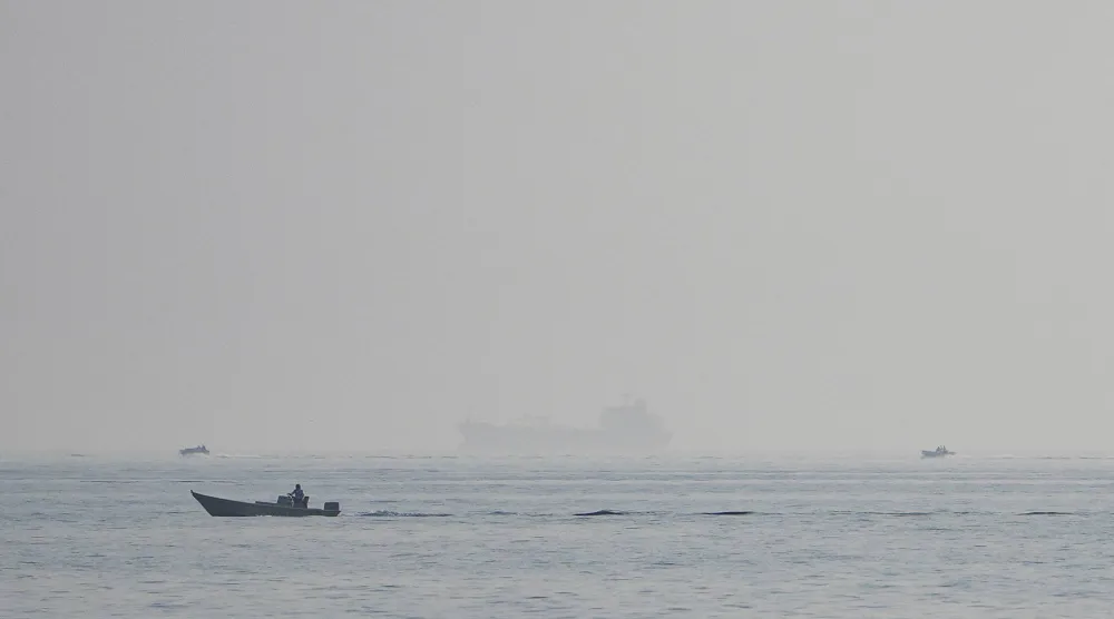 Vessels at the Strait of Hormuz, as seen from Musandam, Oman, July 28, 2026. REUTERS/Stringer