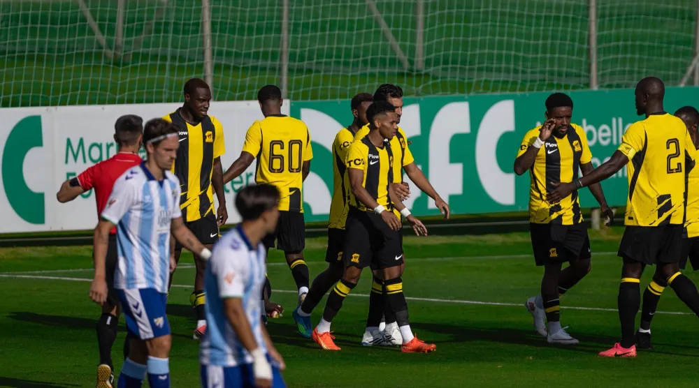 لاعبو الاتحاد يحتفلون بالهدف الثاني أمام ملقا (موقع النادي)