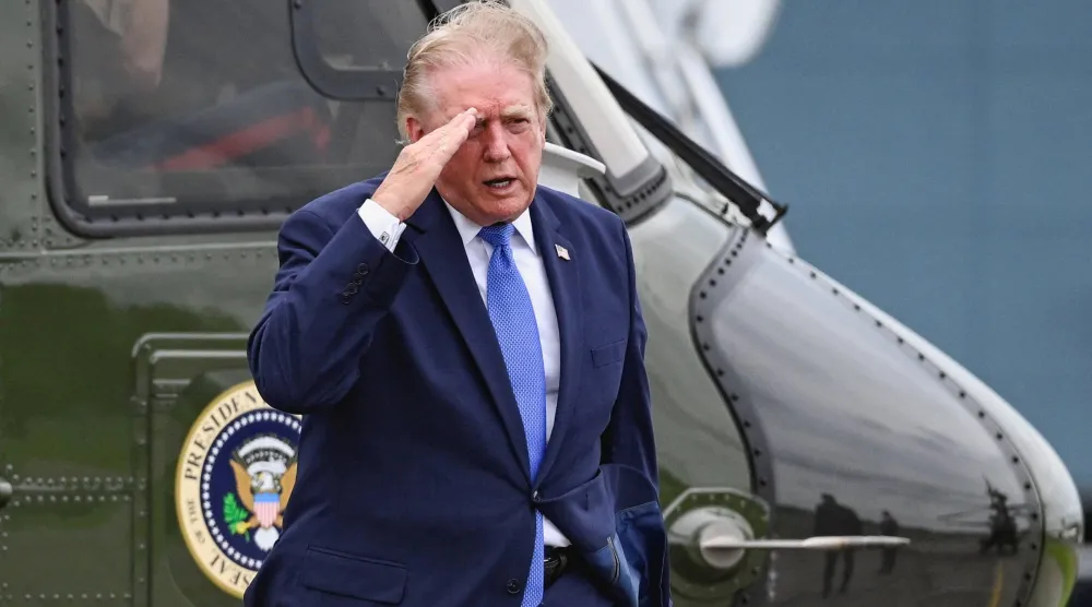 US President Donald Trump salutes after disembarking Marine One at Morristown Municipal Airport in Morristown, New Jersey, US, August 2, 2026. (Reuters)