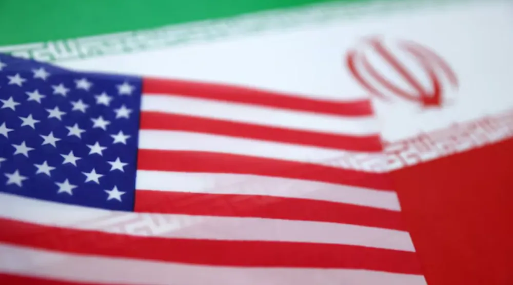 US and Iran flags are seen in this illustration taken June 18, 2025. REUTERS/Dado Ruvic/Illustration/File Photo
