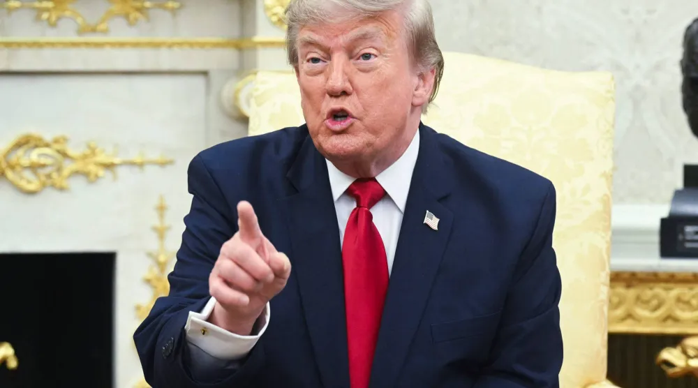 الرئيس الأميركي دونالد ترمب يجيب عن أسئلة من الصحافيين حول إيران خلال اجتماع مع رئيس الوزراء العراقي علي الزيدي في البيت الأبيض يوم 14 يوليو 2026 (أ.ف.ب)