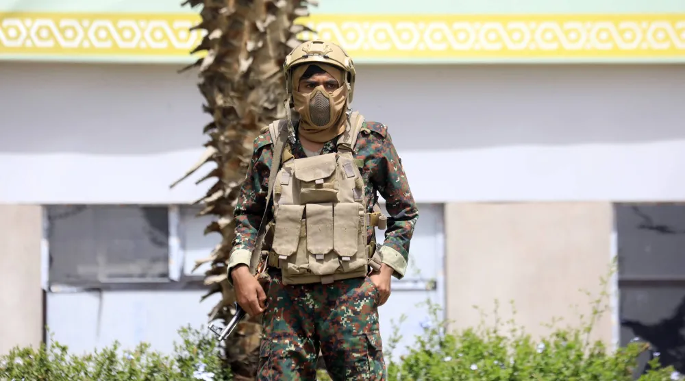 A Houthi militiaman stands guard in the proximity of Sanaa airport, in Sanaa, Yemen, 05 August 2026. EPA/YAHYA ARHAB