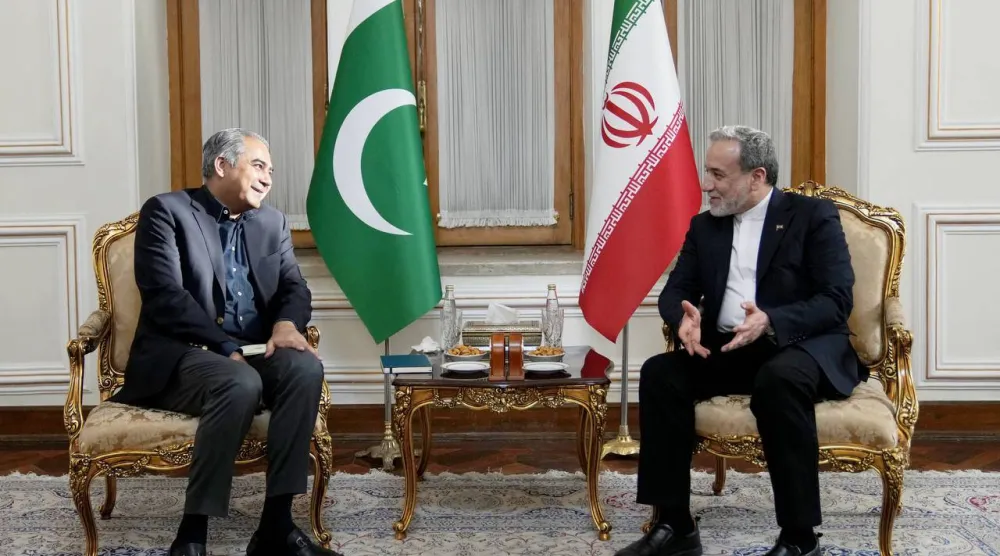 A handout photo made available by the Iranian Foreign Ministry Office shows Iranian Foreign Minister Abbas Araghchi (R) meeting with Pakistan's Minister of Interior Mohsin Naqvi in Tehran on August 11, 2026. (Iran Foreign Ministry / AFP) 