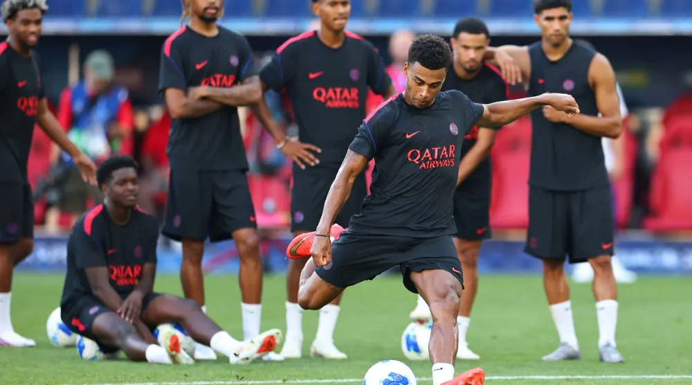 Désiré Doué of PSG attends the team’s training session in Salzburg, Austria, 11 August 2026. (EPA)