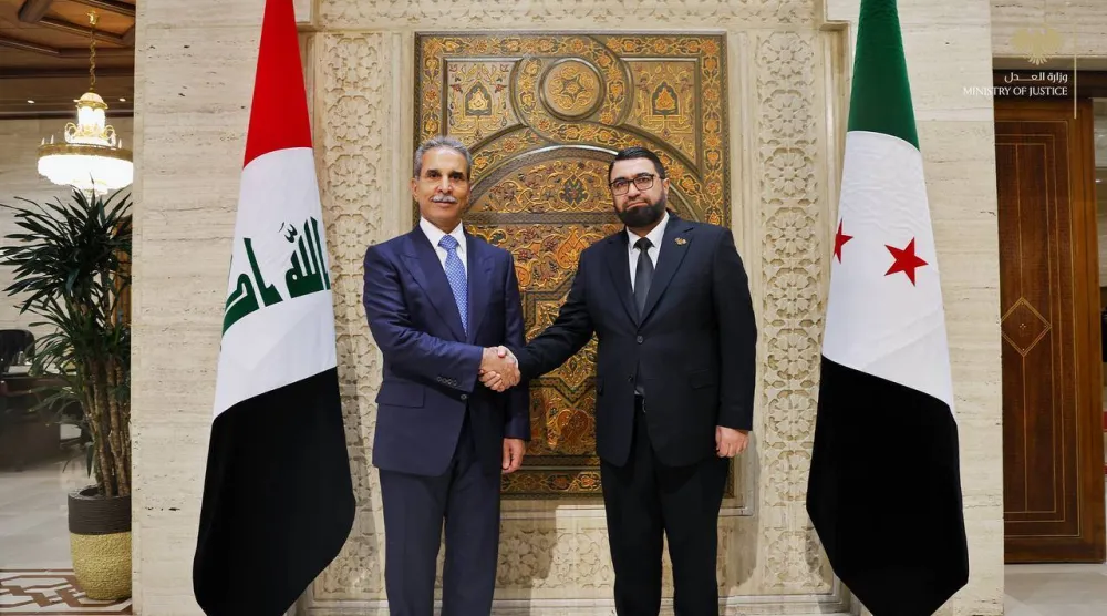 وزير العدل السوري مظهر الويس ورئيس مجلس القضاء الأعلى العراقي القاضي فائق زيدان في دمشق اليوم (وزارة العدل)