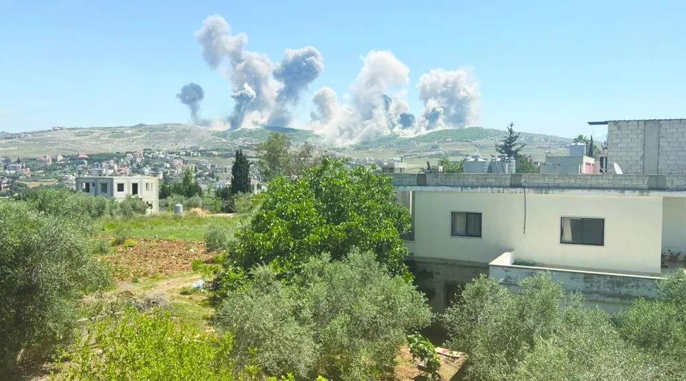 الدخان يتصاعد جرّاء القصف على مرتفعَي علي الطاهر والدبشة في جنوب لبنان (أرشيفية - الوكالة الوطنية للإعلام)