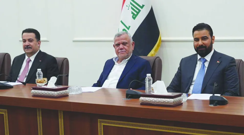 رئيس الحكومة علي الزيدي وعضو «التنسيقي» هادي العامري ورئيس تحالف «التنمية» محمد شياع السوداني (الإطار التنسيقي)