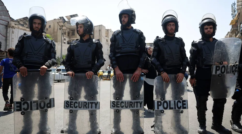 عناصر أمن سورية في دمشق (أ.ب)