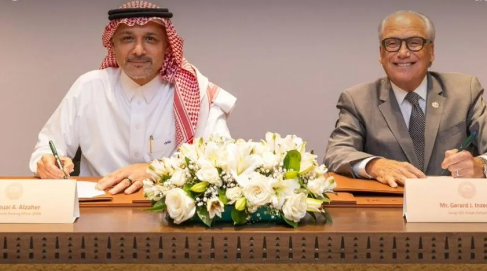 أثناء مراسم توقيع الاتفاقية (البنك العربي الوطني)