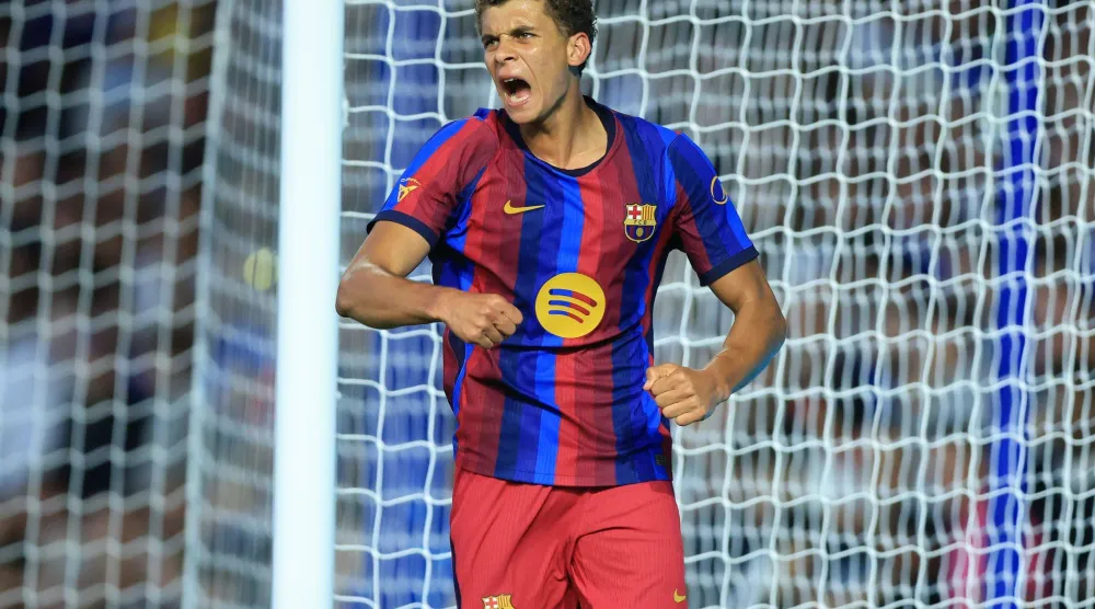 31 July 2026, United Kingdom, Birmingham: Barcelona's Hamza Abdelkarim celebrates scoring his side's second goal during a pre-season friendly soccer match between Birmingham City and Barcelona at St Andrew's @ Knighthead Park. (dpa)