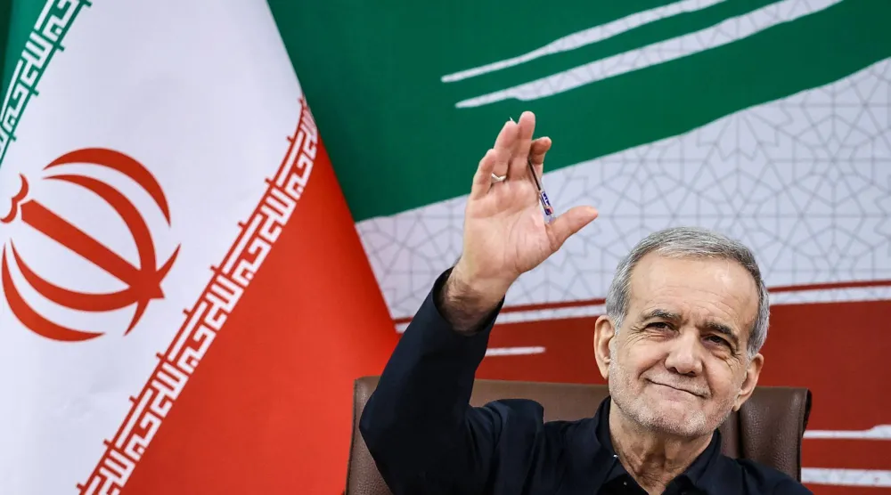 A handout photo made available by the Iranian Presidential Office shows Iran's President Masoud Pezeshkian attending a press conference in the capital Tehran, on August 8, 2026. (Photo by Iranian Presidential Office / AFP) / 