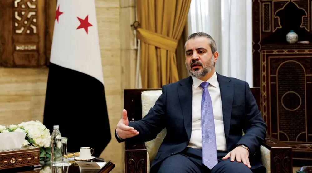 Suriye Dışişleri Bakanı Esad el-Şeybani, Reuters ajansına röportaj verirken, (Reuters)