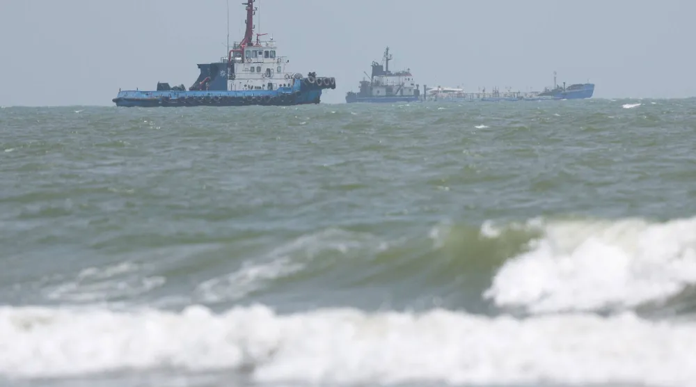 Vessels in the Strait of Hormuz are visible near the beach of Bandar Abbas, Iran, August 25, 2026. Majid Asgaripour/WANA (West Asia News Agency) via REUTERS