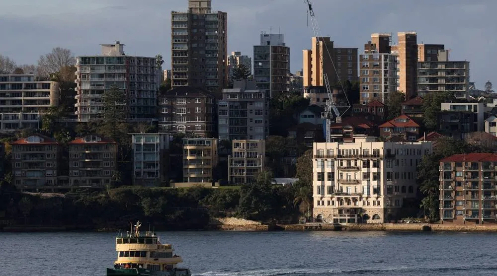 A ferry passes in front of apartments in Sydney, Australia, August 18, 2026. (Reuters)