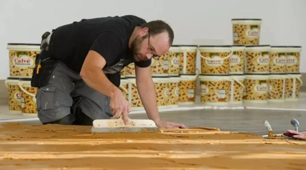 The peanut butter had to be spread as smoothly as possible, without lumps. AFP
