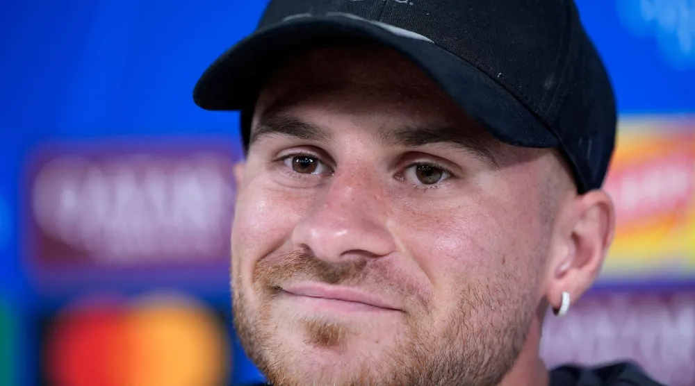  08 September 2026, United Kingdom, Liverpool: Liverpool's Alexis Mac Allister reacts during a press conference at Anfield, ahead of Wednesday's UEFA Champions League soccer match against Atletico Madrid. (dpa)