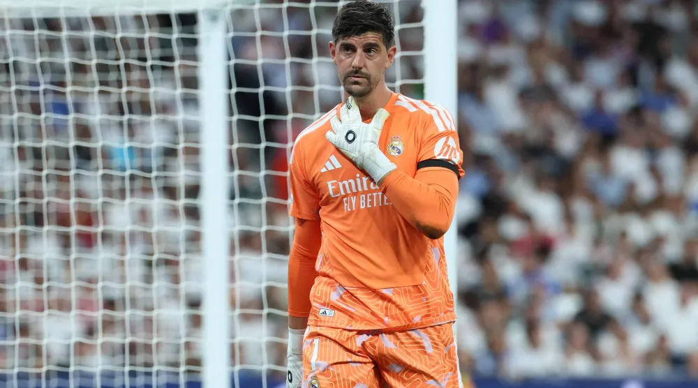 Real Madrid's Belgian goalkeeper #01 Thibaut Courtois gestures after recovering from an injury during the UEFA Champions League first round day 1 football match between Real Madrid and Inter Milan at the Santiago Bernabeu stadium in Madrid on September 8, 2026. (AFP)