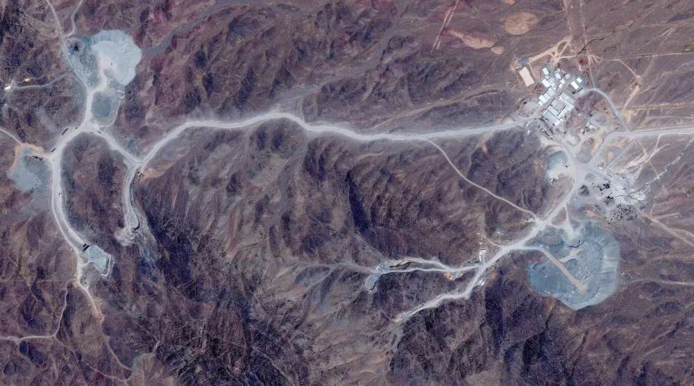 FILE PHOTO: A satellite view shows tunnel entrances at Pickaxe Mountain, of the Natanz nuclear facility, near Natanz, Iran, June 30, 2026. Vantor/Handout via REUTERS