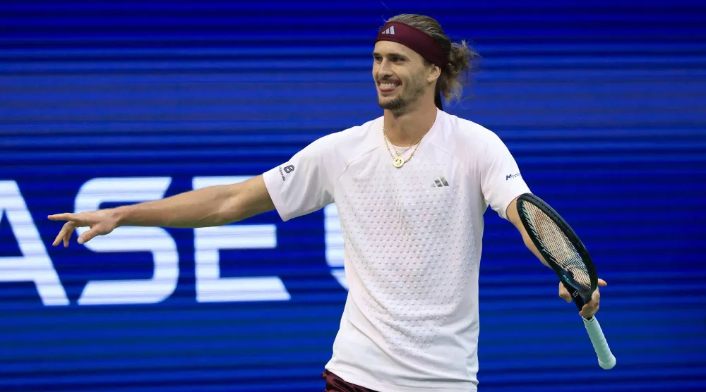 NEW YORK, NEW YORK - SEPTEMBER 11: Alexander Zverev of Germany celebrates match point after defeating Karen Khachanov during their Men's Singles Semifinal match on Day Thirteen of the 2026 US Open at USTA Billie Jean King National Tennis Center on September 11, 2026 in the Flushing neighborhood of the Queens borough of New York City. Matthew Stockman/Getty Images/AFP