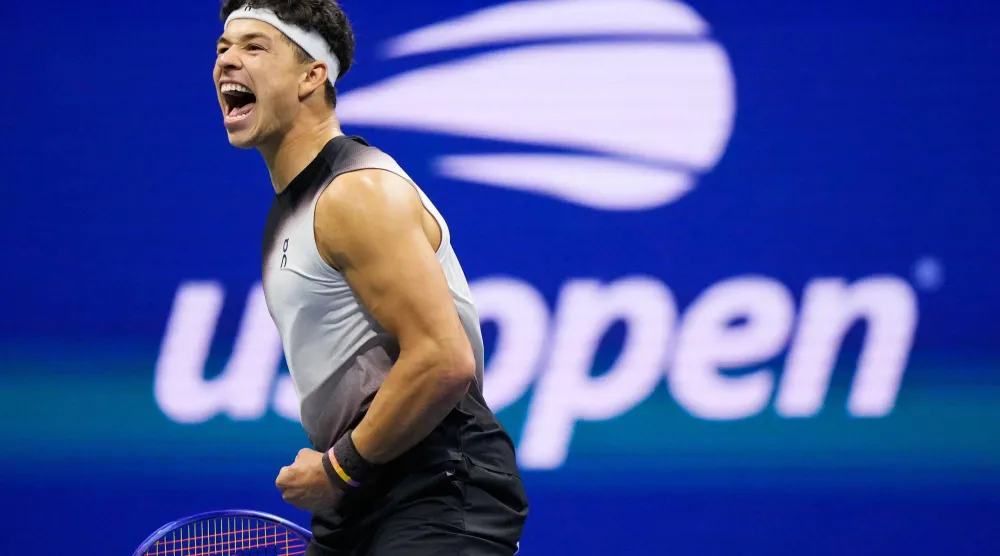 Ben Shelton, of the United States, reacts during the second set during the men's singles semifinals of the US Open tennis championships against Frances Tiafoe, of the United States, Friday, Sept. 11, 2026, in New York. (AP Photo/Frank Franklin II)