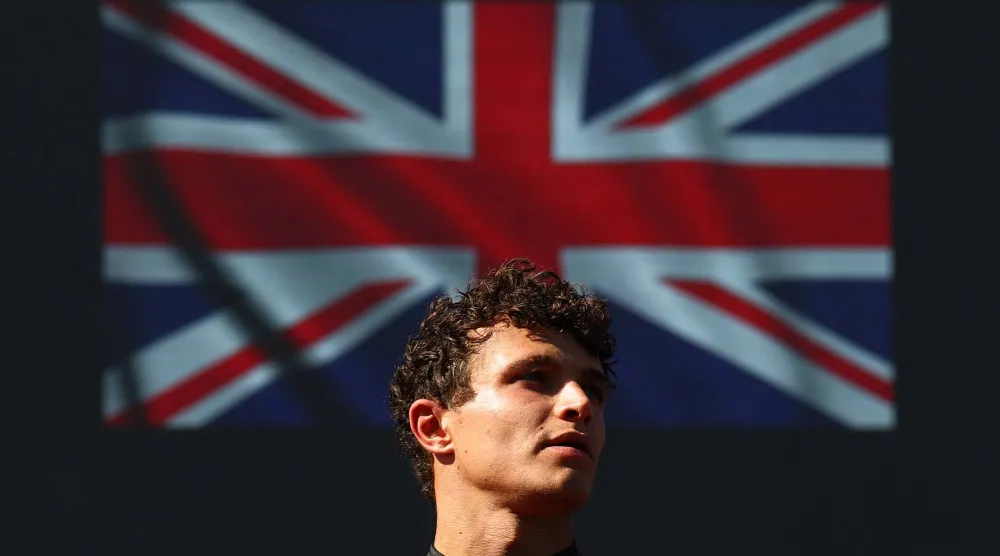 Formula One F1 - Spanish Grand Prix - Madring, Madrid, Spain - September 13, 2026 McLaren's Lando Norris celebrates on the podium after finishing third in the Spanish Grand Prix. (Reuters)