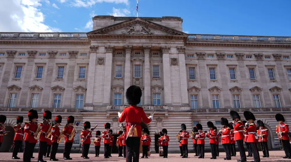  11 September 2026, United Kingdom, London: Members of the Massed Bands of the Guards Division perform on the forecourt of Buckingham Palace in London during a commemorative Changing of the Guard ceremony marking the 25th anniversary of the 11 September 2001 terrorist attacks. (dpa)