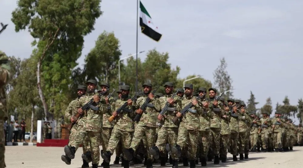 عرض عسكري خلال حفل تخريج أفراد الفرقة 56 بالجيش السوري 1 يونيو 2025 (وزارة الدفاع)
