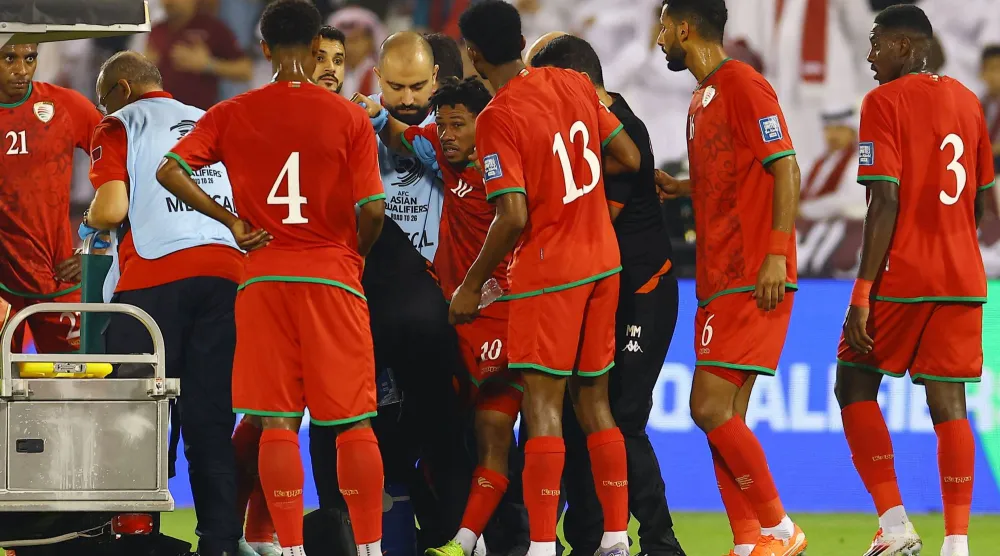منتخب عمان خلال التصفيات الآسيوية الأخيرة (رويترز)
