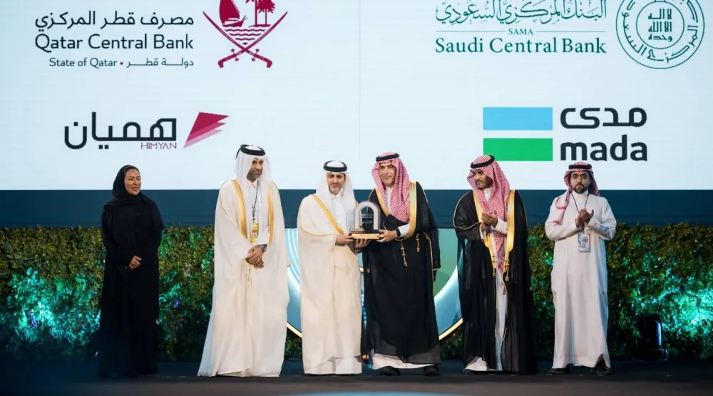 أثناء مراسم إعلان اتفاقية البنك المركزي السعودي ومصرف قطر المركزي (الشرق الأوسط)