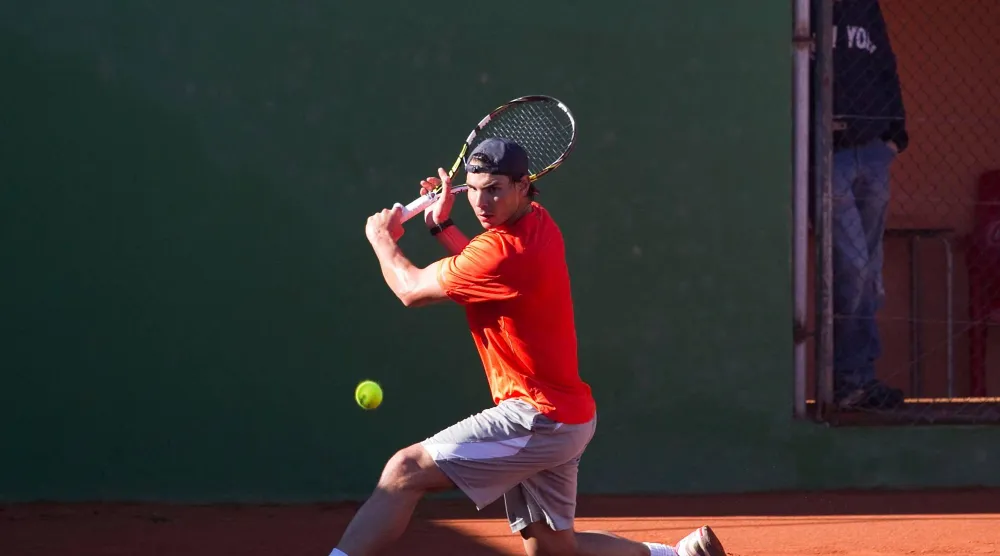 Spanish tennis player Rafael Nadal takes part in a training session in Manacor on the Spanish Balearic Island of Mallorca on January 30, 2013. (AFP) 